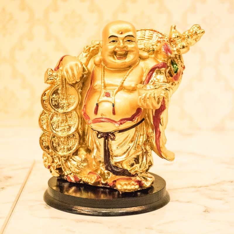 Laughing Buddha Holding Golden Ball