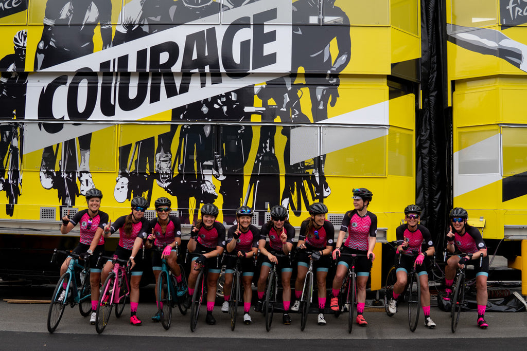 The InternationElles team celebrate in France after completing a stage of the Tour de France