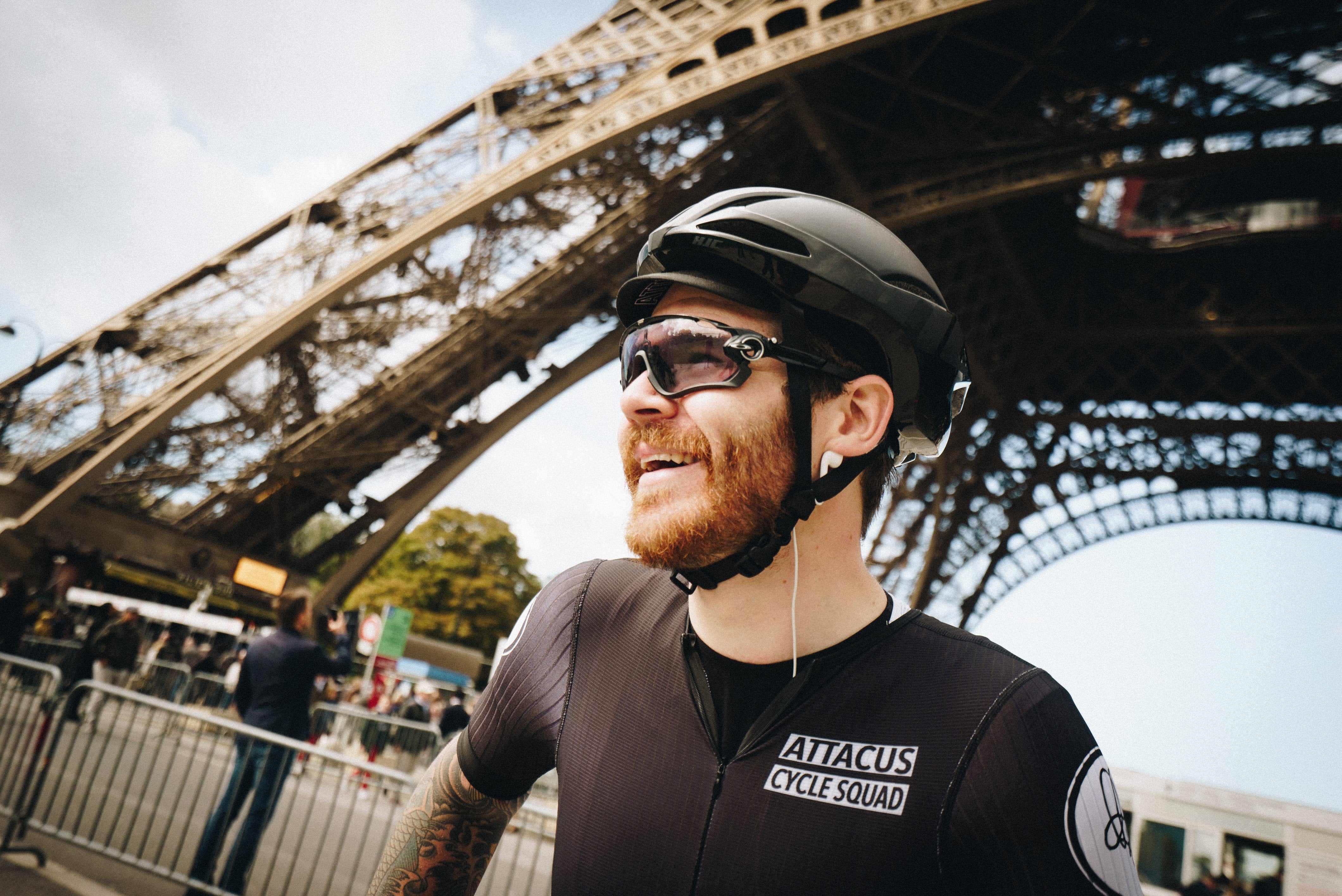 Chris arrives in Paris wearing Attacus Cycling sqaud skin suit