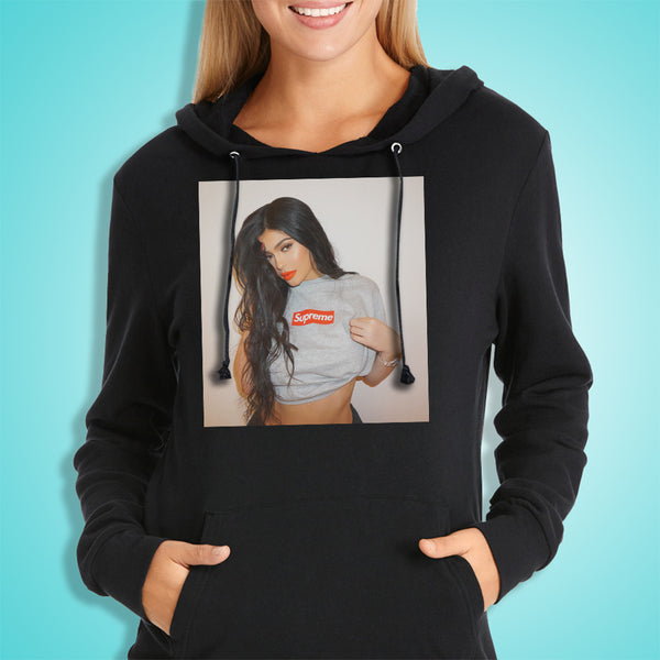 girl wearing supreme hoodie