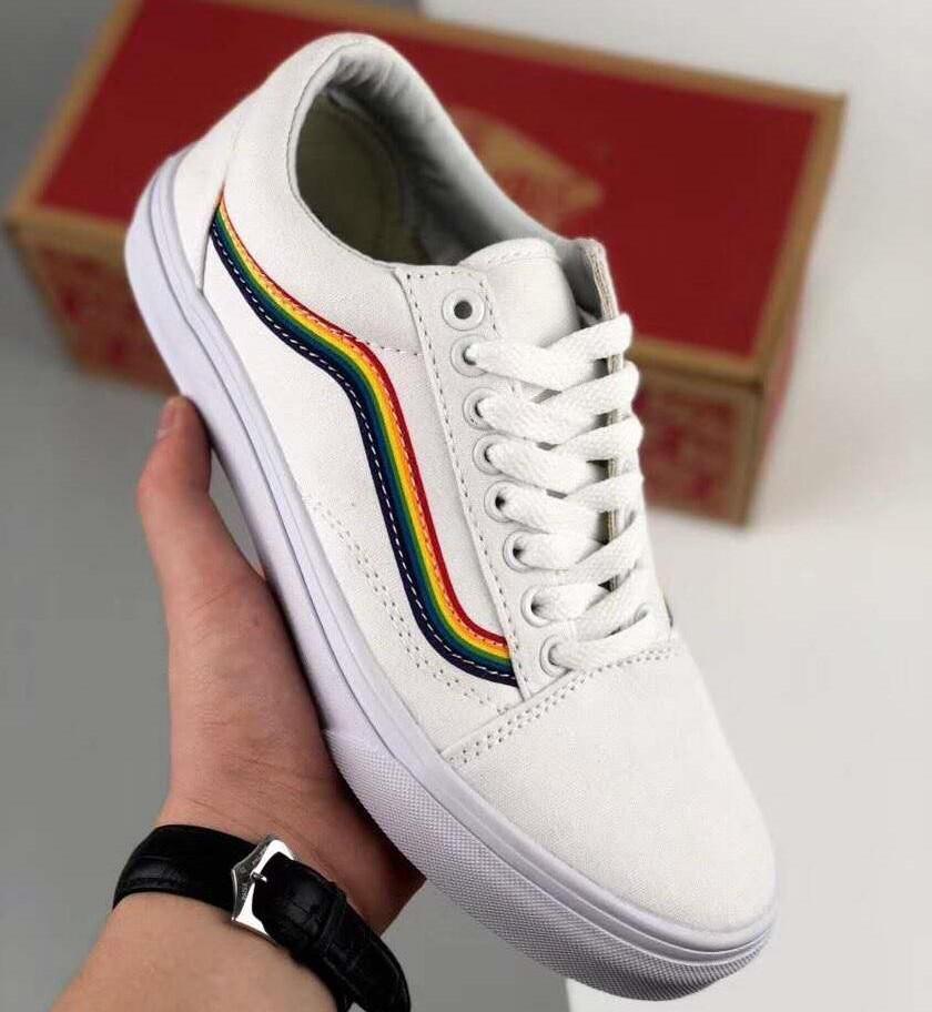 white and rainbow vans
