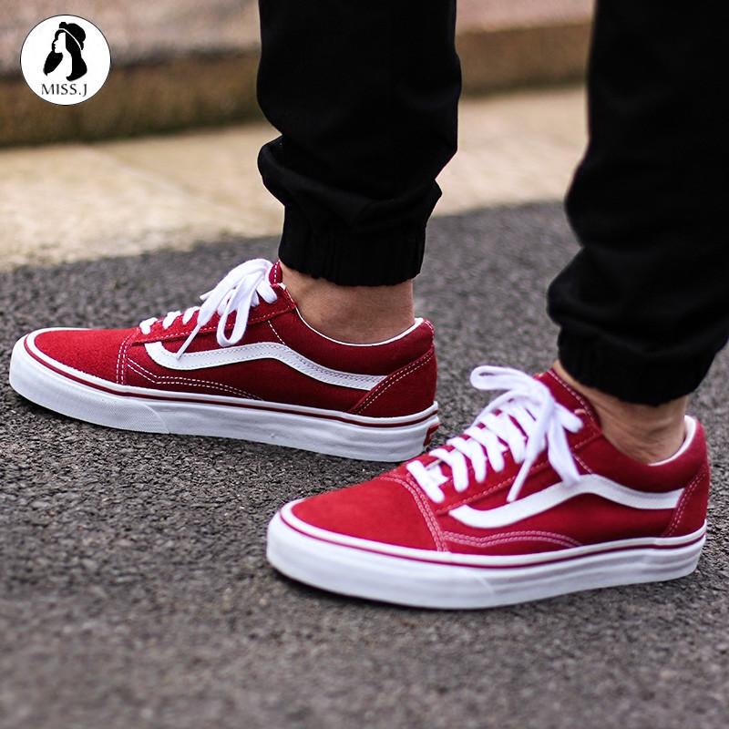 red old skool vans on feet