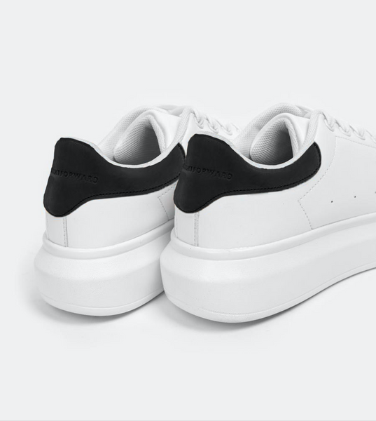 white sneakers with black back