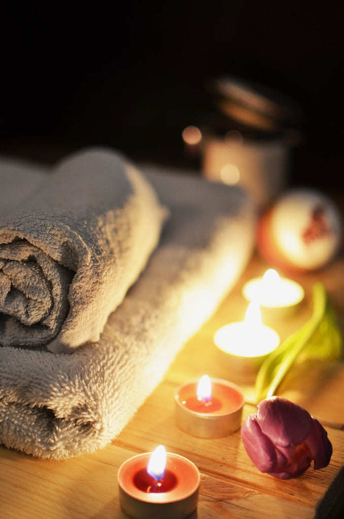 towels and candles in a sauna