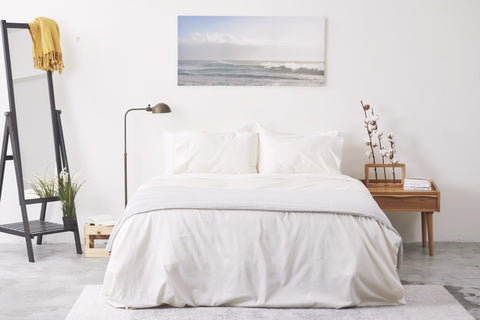 Knotte bedsheet setting in naturally lit bedroom