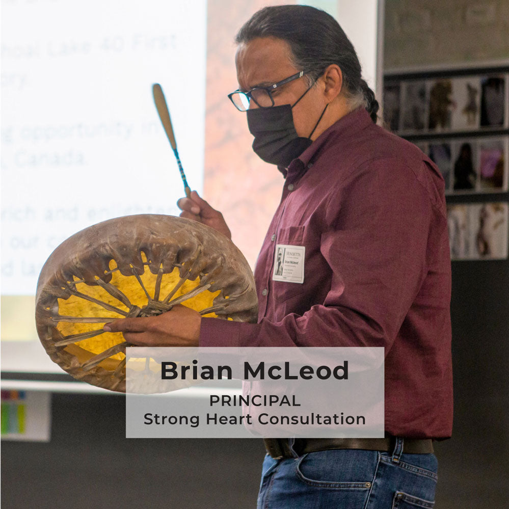 Brian McLeod, a community spiritual teacher, performs a traditional song