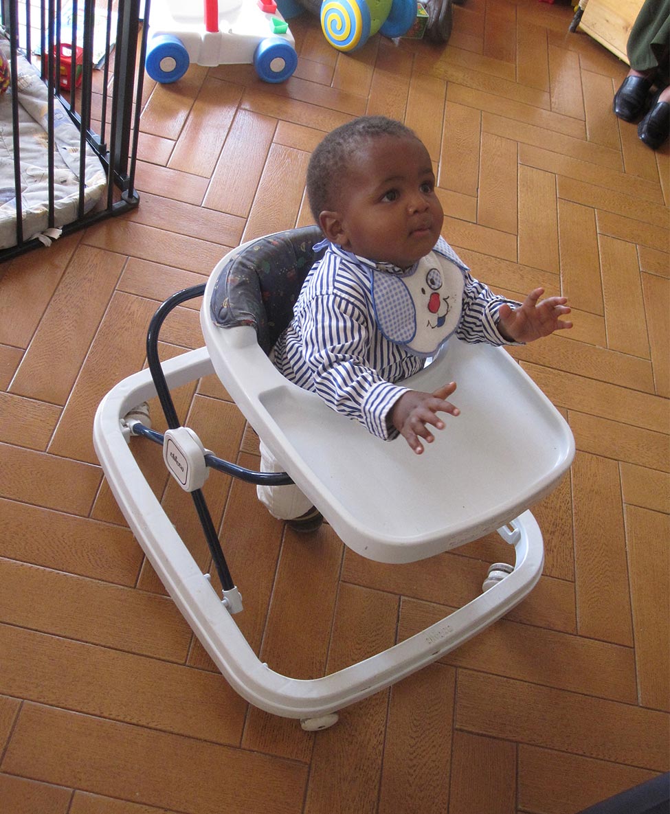 An infant being cared for at New Life Home orphanages in Nairobi and Lamu, Kenya