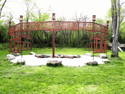 Custom backyard fire pit and wind barrier