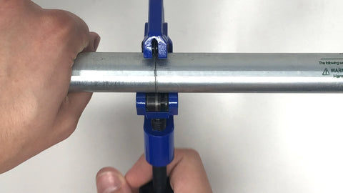 Using the Maker Pipe conduit cutter to cut conduit