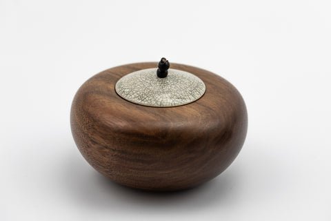 Walnut Pebble Pot and Raku Lid by Kate Schuricht, available at Padstow Gallery, Cornwall