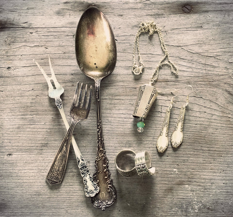 Antique silverplate and sterling silver silverware and jewelry made out of old silverware this photo shows the before and after.