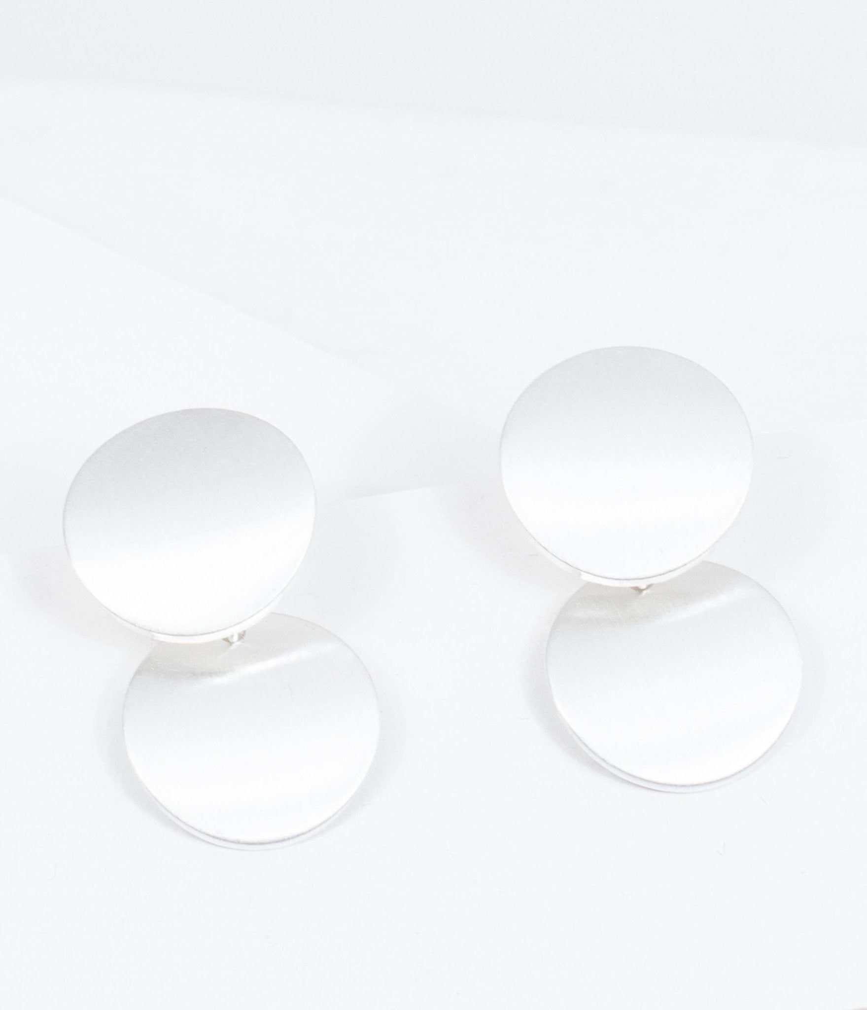 

Brushed Silver Circle Dot Drop Earrings