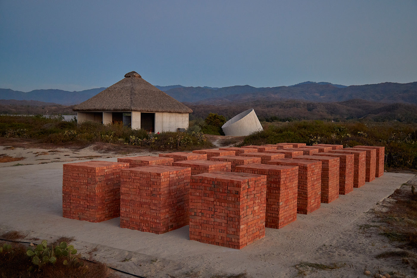Building material in form of bricks stacked on the Casa Wabi grounds.