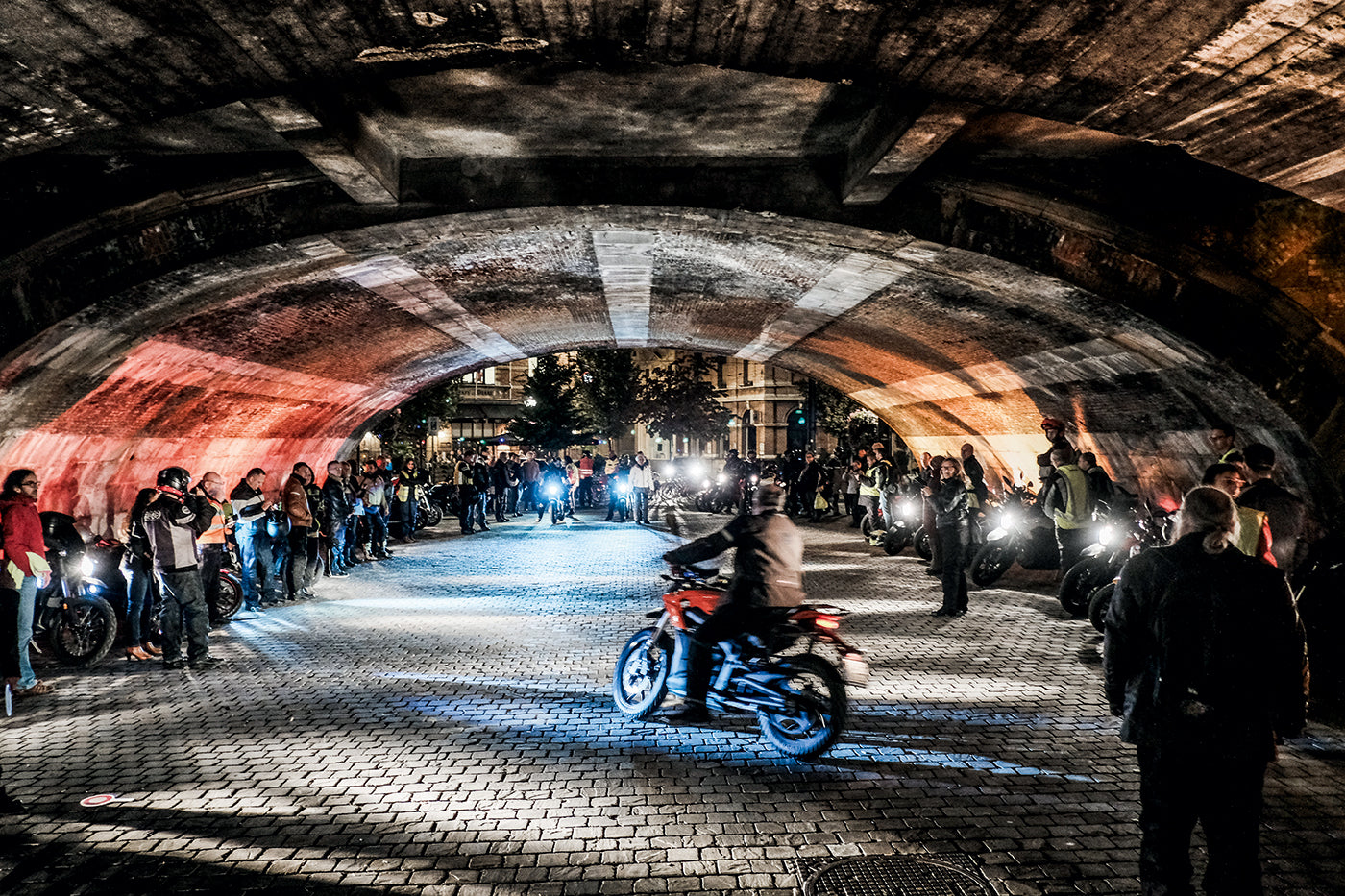 E-bikers meeting under a bridge at the first Electric Night Ride in Antwerp, Belgium, on October 8, 2016. (Photo: Bob van Mol)