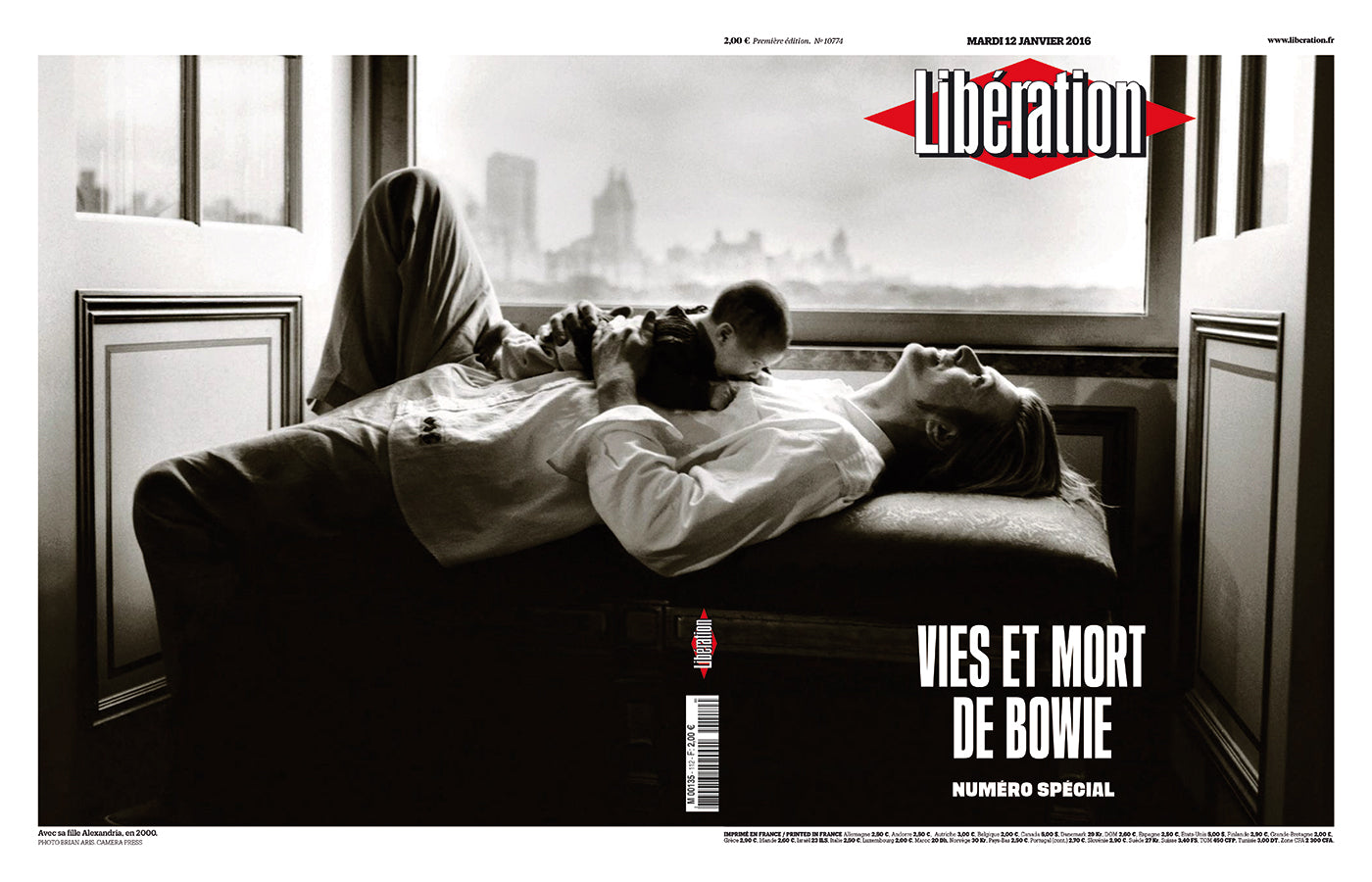 David Bowie on the cover of French newspaper Libération on the occasion of the artist's death in 2016. His infant daughter lying on his stomach. (Photo: Libération)