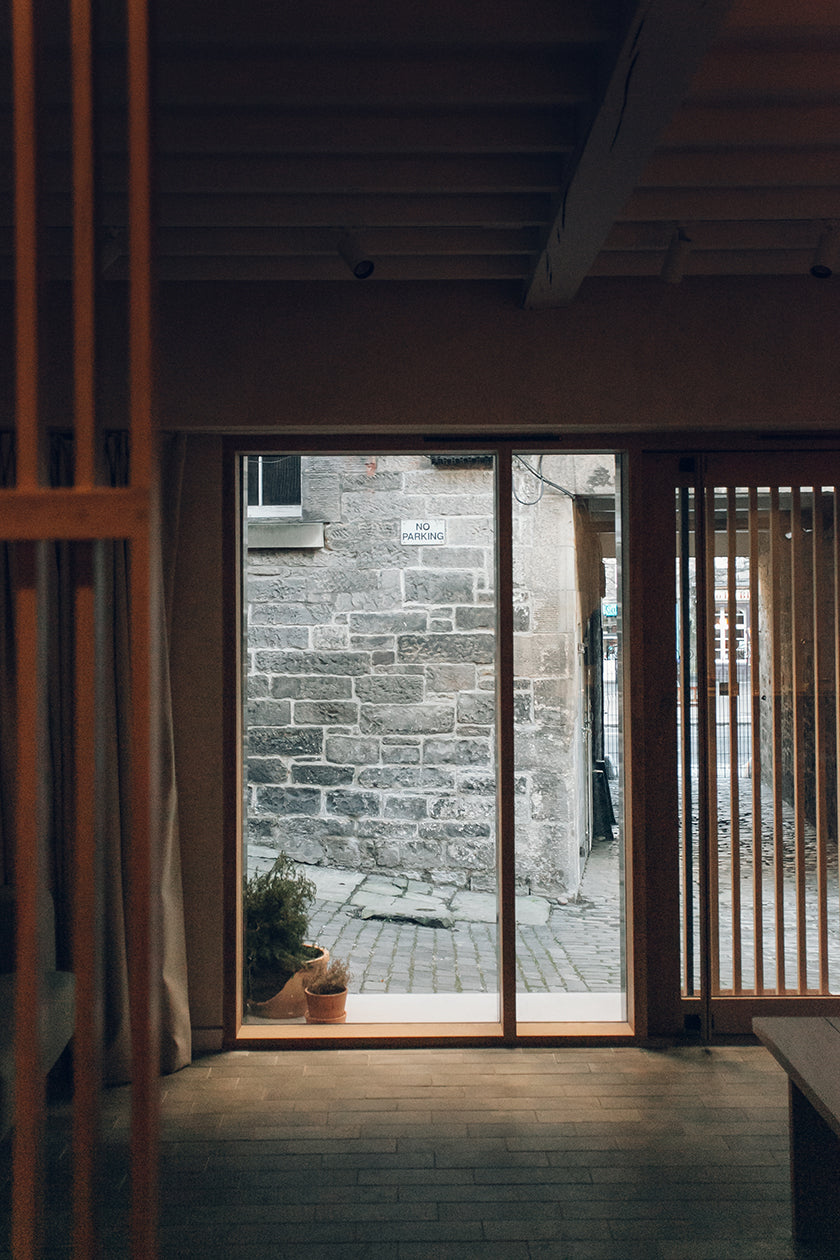 Shot of a timber door in a studio designed by Izat and Arundell in Edinburgh. (Photo: Haarkon)