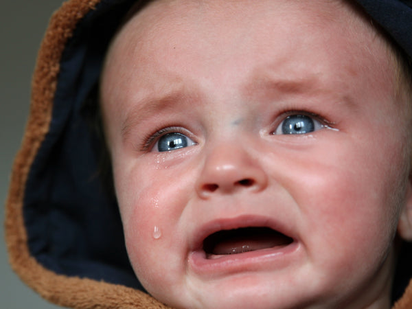 crying baby with tears