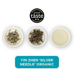 Yin Zhen Organic loose leaf tea – three cups showing the plain leaf, the unfurled leaf with the water added and then the final brew of tea.