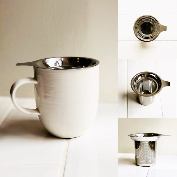 A plain white mug with an in-cup loose leaf strainer are sat on some white tiles. The right-side of the image is three smaller images, showing different angles of the strainer.