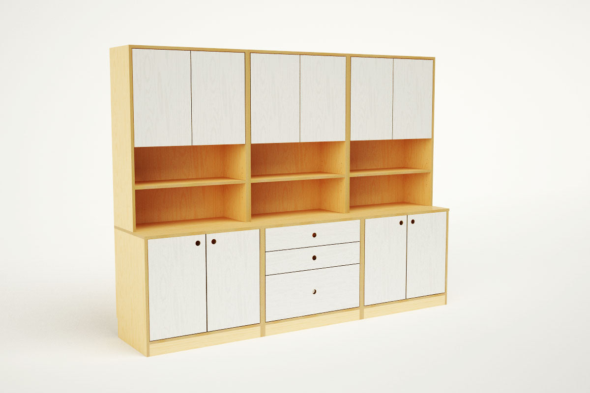 Contemporary wooden bookshelf with cabinets and drawers isolated on white.