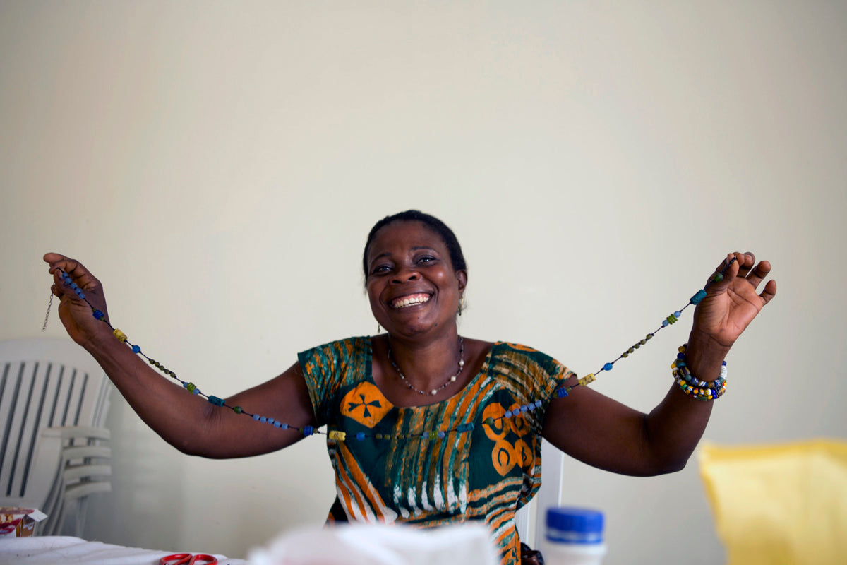 Woman holding beads