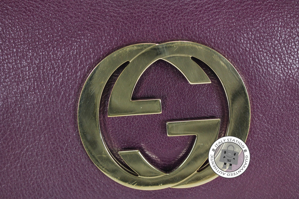 purple gucci logo