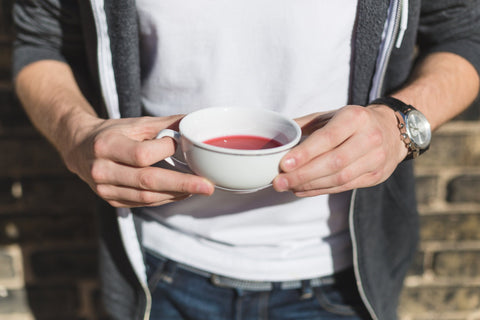 Man drinking rooibos tea