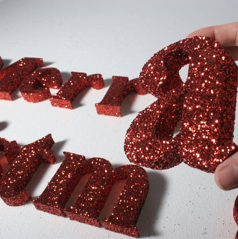 red glittered polystyrene letters