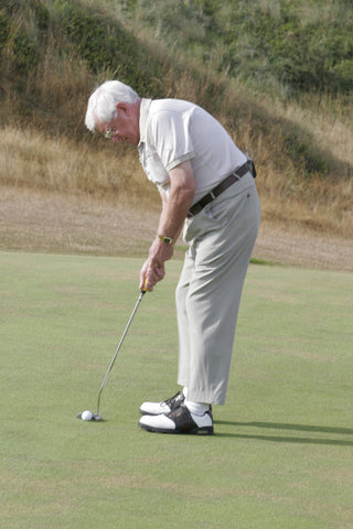 Harold Swash hitting a golf ball