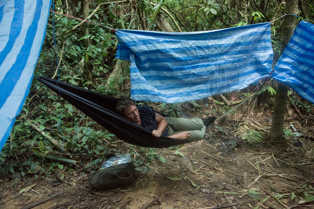 Early wake-up call - Russ Malkin with his Billingham Weekender in the jungle.