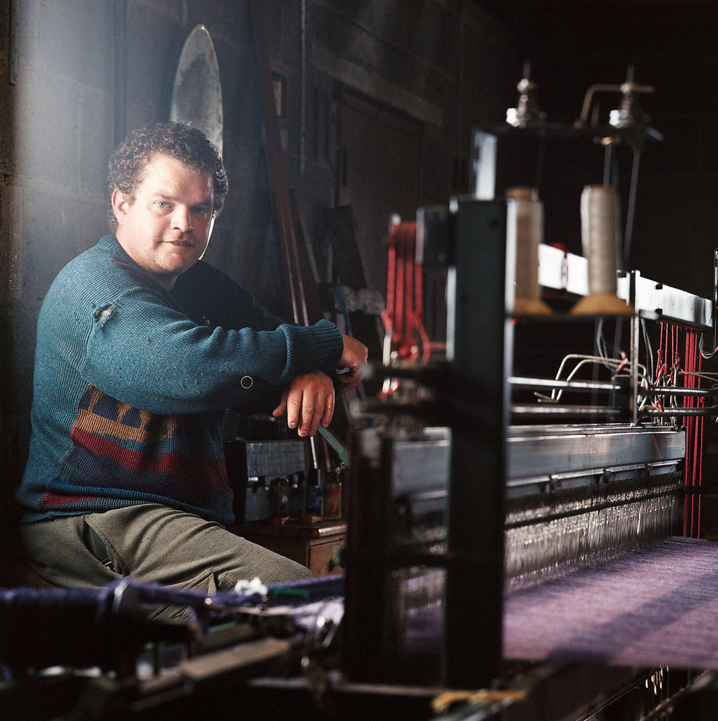Calum in his weaving shed in Lewis, from Lara's book, 'Harris Tweed, from Land to Street' (Frances Lincoln Publishing).