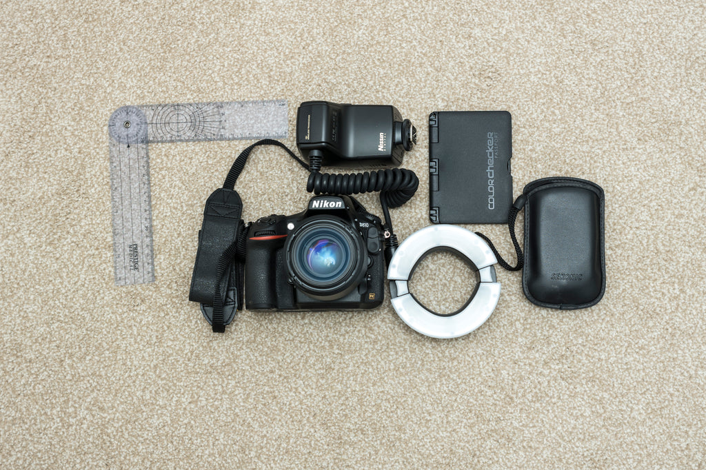 Personal injury kit - Nikon 810 camera with Nikon 50mm F1.4 lens, ring flash, Sekonic light meter, color checker, passport and medical ruler