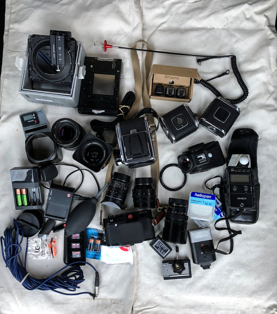 Commercial shoot: Hasselblad 500cm, Hasselblad Carl Zeiss distagon f/3.5 60mm, Zeiss Sonnar 150mm f/4, Hasselblad Proshade 6093T, Hasselblad PolaPlus Polaroid Film Back, Hasselblad viewfinder, FlashQ wireless flash shoes and leads, Polaroid film timer, Leica M240 with 35mm f/1.4 SUMMILUX-M lens, Leica M6, SUMMILUX-M 24mm f/1.4 ASPH lens, SUMMILUX-M 75mm f/1.4 lens, Minolta Light meter and accessories. Photo by Lara Platman.