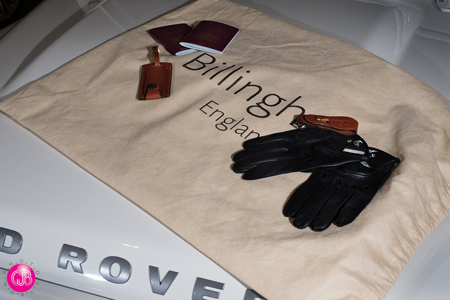 Billingham Drawstring bag, Luggage Tally and Key fob on the hood of Land Rover