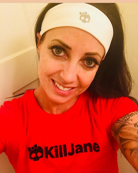 Joelle wearing KillJane red shirt