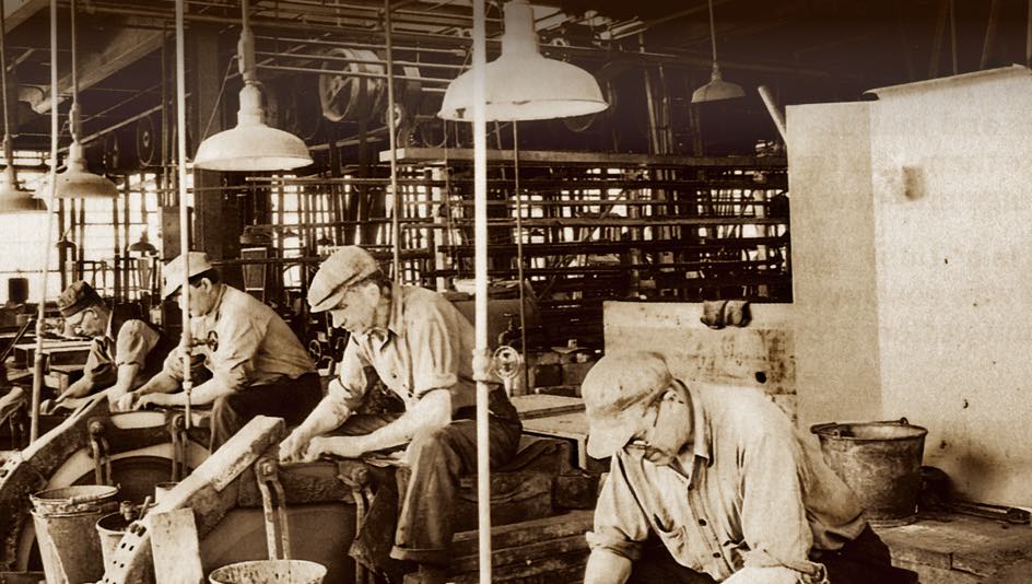 Historical photo of Case employees in factory