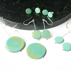 earrings with mermaid scale pattern