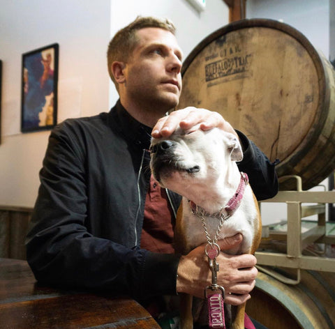 Owner and dog at saulter street brewery in Toronto as one of the few dog friendly breweries