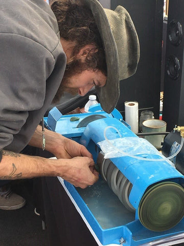 polishing a Tanzurine in Tanzania