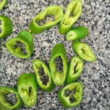 green peppers sliced in pan 