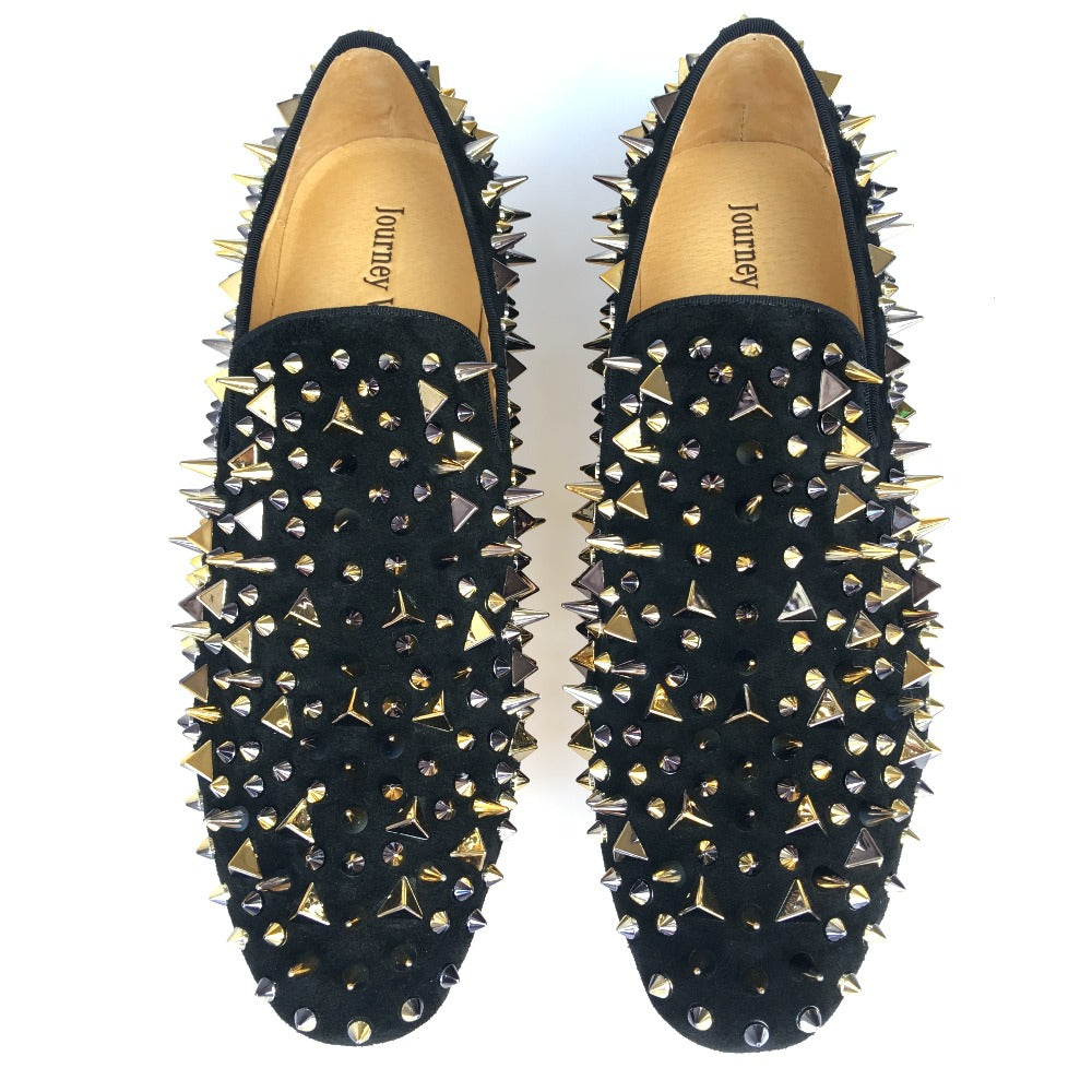 black shoes with gold spikes