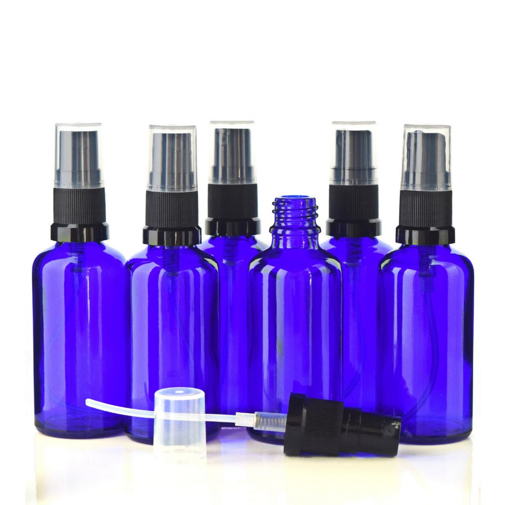 purple glass spray bottles