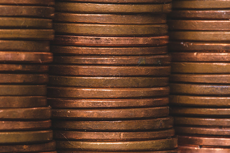Stack of copper coins for vase