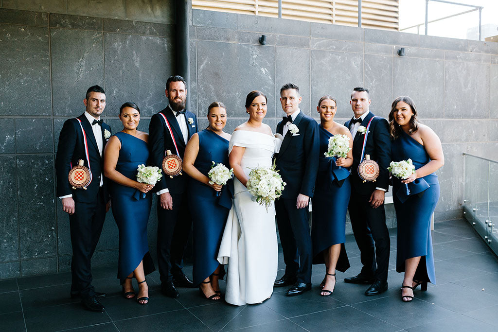 Bridal party at wedding with wedding flowers