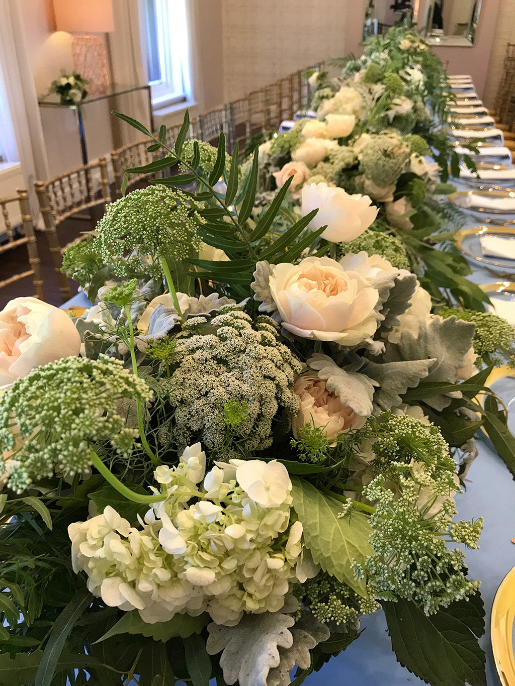 Wedding flowers at the reception table setting