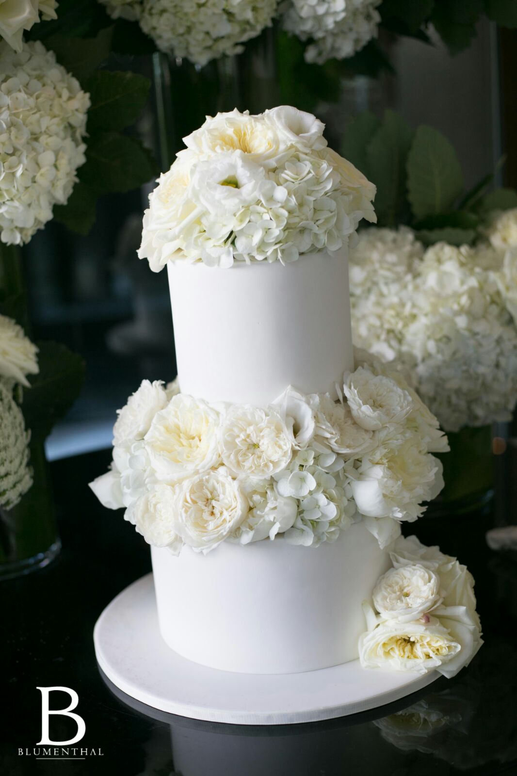 Wedding Cake Decorated with White Flowers