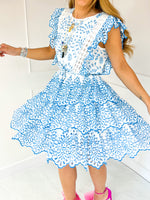 The Portofino Broderie Anglaise Mini Dress In Blue