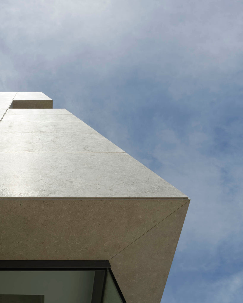 grigio alpi facade corner building natural stone malta rlautier