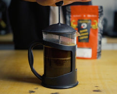 cafetiere fill of fresh brewed cannonball coffee being plunged