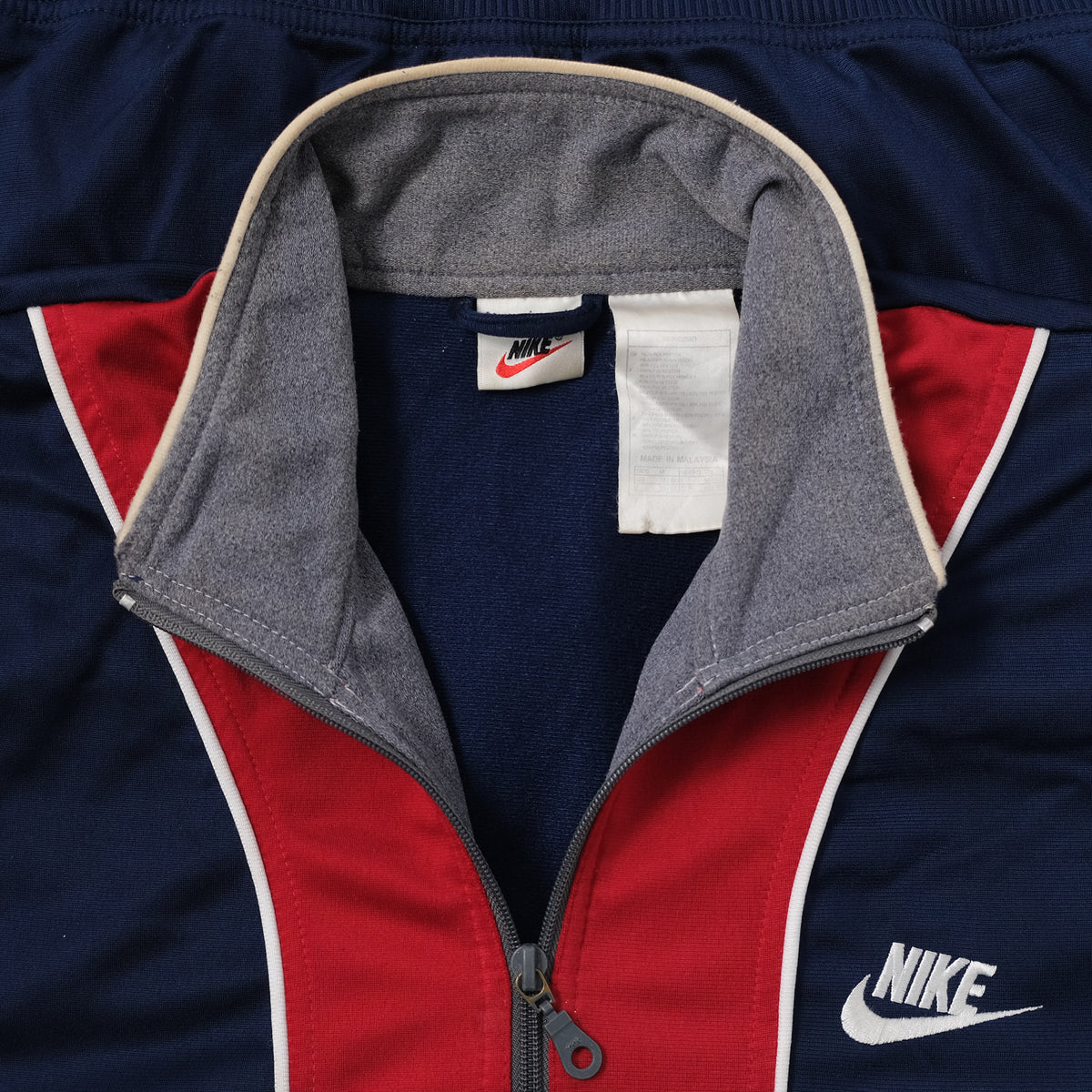 navy blue nike track jacket